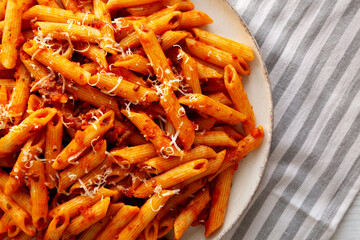 Homemade Pasta Bolognese with Cheese on a Plate, top view.