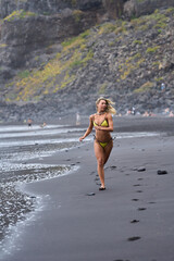 Woman jogging on the beach