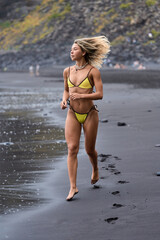 Woman jogging on the beach
