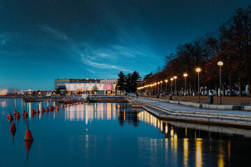 Fototapeta premium Helsinki, Finland. Night View Of City Park Meripuisto. Street Promenade At Night. Night stars sky