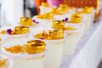 Golden color bowl and flowers. Equipment prepared for Water Festival in Thailand.