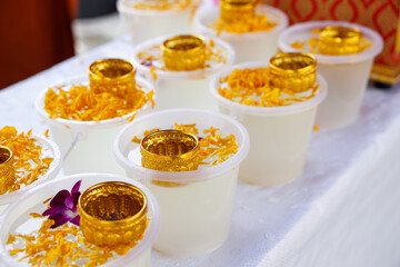 Golden color bowl and flowers. Equipment prepared for Water Festival in Thailand.