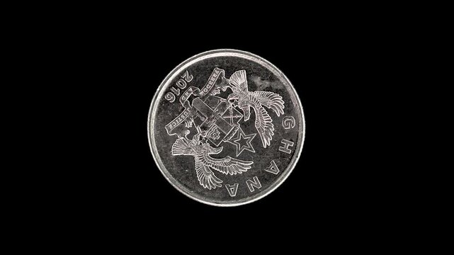 Ghana 2016 10 pesewas coin obverse with national arms rotating on black background