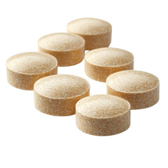 Brown dietary supplement tablets arranged in a group with textured surface on transparent background, cutout PNG