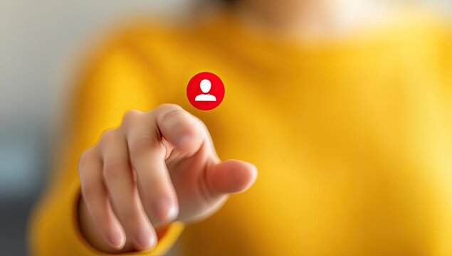 Close-up of a hand touching a floating user icon