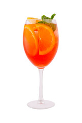 Refreshing summer cocktail with citrus and mint garnishes in glass