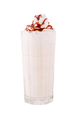 Delicious milkshake topped with whipped cream and chocolate syrup in a glass
