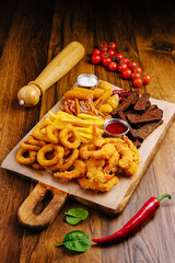 Delicious seafood platter with crispy shrimp and assorted sides displayed