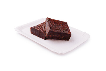 Deliciously rich chocolate brownies on a white plate