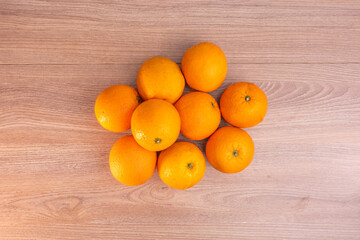 The Real orange  photographs taken with a high-resolution camera and stacking technique. on brown wooden background