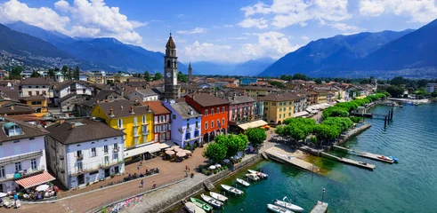 Fotobehang  Switzerland travel and landmarks - colorful charming town Ascona, lake Lago Maggiore near Locarno , canton Ticino . panoramic view of old town © Freesurf
