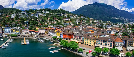 Fotobehang Switzerland travel and landmarks - colorful charming town Ascona, lake Lago Maggiore near Locarno , canton Ticino . aerial drone panoramic view of old town © Freesurf
