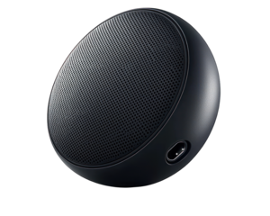 Dark gray, spherical portable speaker.  Small, round,  audio device.  Solid, matte finish.  Charging port visible