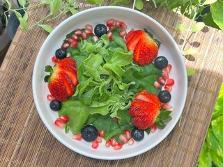 Crystal Ice Plant with strawberry, blue berry and pomegranate salad