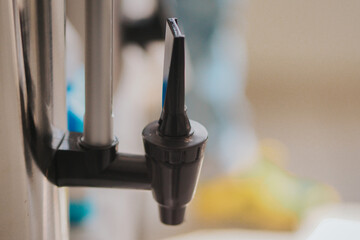 selective focus of water dispenser tap