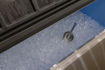 Ice cubes store in ice making machine for clean product. Ice cube maker. Cube ice machine. Suitable...