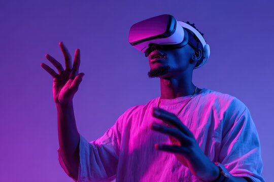 Virtual Reality Enthusiastic Black man in neon light engaging with air while gaming amazed against a purple backdrop panoramic view with space for text