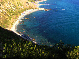 Breathtaking panoramic view of the sparkling sea along the southern coast of Italy in Calabria....
