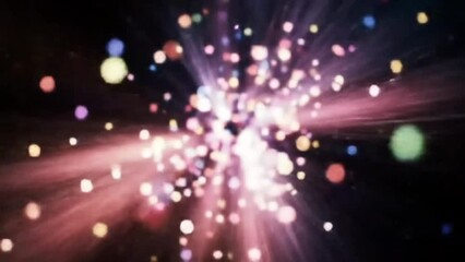 Colorful particle explosion radiating light beams in abstract cosmic background
 - Powered by Adobe
