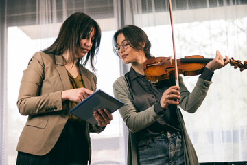 Student Learning How To Play Violin