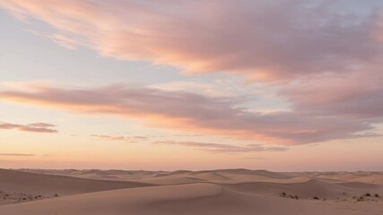 Serene desert landscape with sand dunes in pastel pink colors representing tranquility at sunset