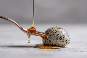 National Ice Cream Day: Extreme Macro of Black Sesame Ice Cream Scoop with Perfect Fork Ridges & Honey Drip