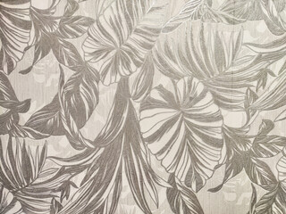 Intricate botanical pattern featuring tropical leaves with a textured background, ideal for design...