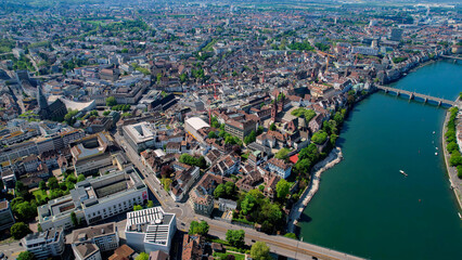 An aerial panoramic view around the old town of the city Basel in Switzerland on a sunny noon in...