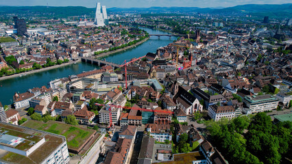 An aerial panoramic view around the old town of the city Basel in Switzerland on a sunny noon in...