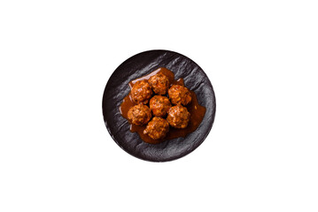 Meat, meatballs in tomato sauce, Italian food, beef or pork with salt . Meatballs with tomatoes