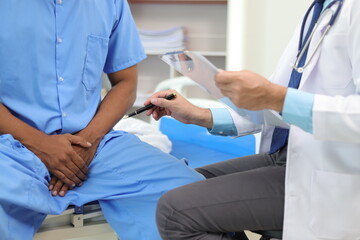 Doctor gives advice to a male patient with symptoms of sexual dysfunction, Male health problems....