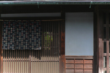 A wooden entrance of the traditional Japanese house.