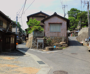 A fork in the road running through the mountainside town.