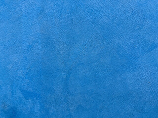 Blue cement or concrete wall texture for backgrounds. Empty space.