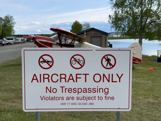 Anchorage, Alaska, USA, white warning sign with red inscription 