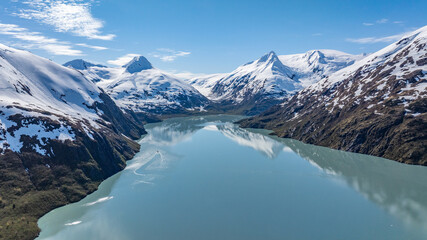 aerial landscape view of Portage Lake with surrounding mountain landscape at Portage Glacier in...