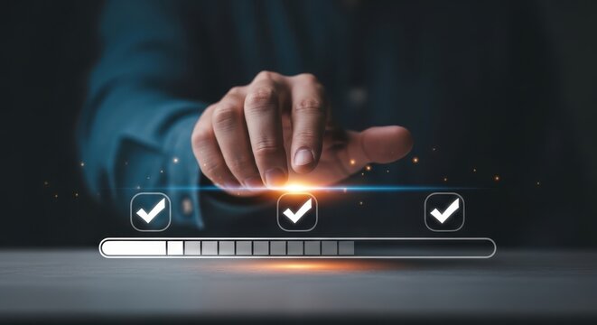 Photo of a hand is touching a screen showing three check marks and a progress bar indicating task completion
