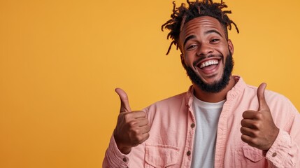 A joyful man flashing a thumbs-up gesture against a bright yellow background, embodying positivity, confidence, and the cheerful vibe of a successful day.