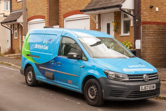 Blue British gas van standing on a street, England, UK