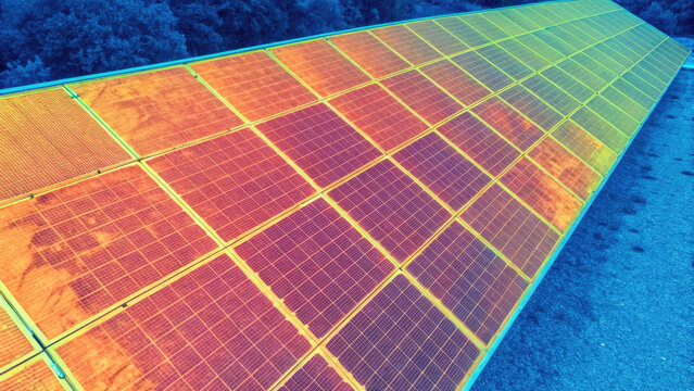 Thermal image of solar panels showcasing heat distribution, efficiency, and renewable energy technology in sustainable environment