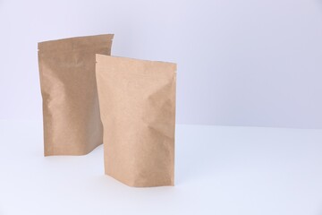 Zipper stand-up pouches on white background. Mockup for design