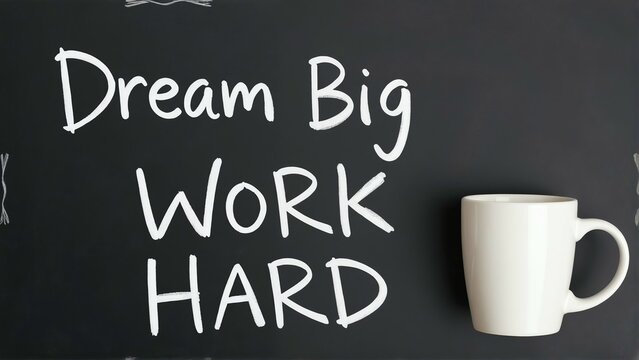 Dream big work hard motivational quote with coffee mug for success and inspiration