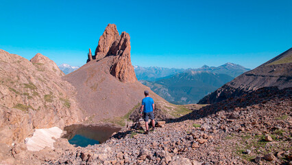 Ascent towards the Agujas de Lavasar, Aragonese Pyrenees, in the Chistau Valley: photograph capturing hiking on one of the most spectacular routes in the Pyrenees, with views of mountain scenery