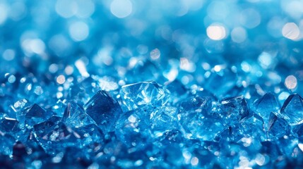 A close-up of blue glittering sugar crystals used for food presentation.