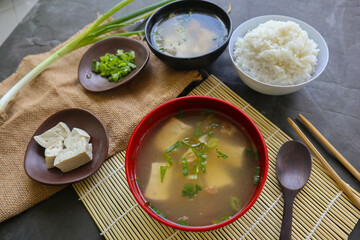 miso soup or Japanese miso soup in bowl on the table. Japanese cuisine in the form of soup with...