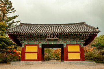 Obraz premium Korean traditional temple with Buddhist wooden buildings, traditional patterns of dancheong and roof tiles