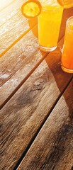 Refreshing Citrus Drinks on Wooden Table in Golden Light