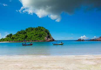 The sea and beaches on Thailand's beautiful islands,Longtail Boats Anchored Beneath Krabi’s...