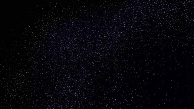 explosion, flash of white particles on black background, fireworks, shining dynamic sparkles 