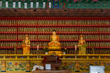 Fototapeta premium Korean traditional temple with Buddhist wooden buildings, traditional patterns of dancheong and roof tiles